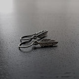 Gunmetal Feather Earrings, blackened silver feather, tiny feather earring, small gun metal feather, little feather dangle, simple feather, silvery black feather earring