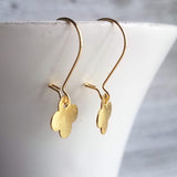 Gold Clover Earrings - small brushed 4 lobe leaf good luck charm dangle on simple latching kidney ear hook - St Patricks Day gift - Constant Baubling