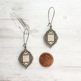 Moroccan Trellis Earrings - antique silver finish thick fanciful medallions on long stainless steel hypoallergenic latching kidney hooks - Constant Baubling