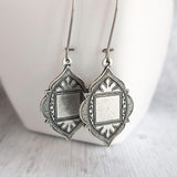 Moroccan Trellis Earrings - antique silver finish thick fanciful medallions on long stainless steel hypoallergenic latching kidney hooks - Constant Baubling