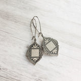 Moroccan Trellis Earrings - antique silver finish thick fanciful medallions on long stainless steel hypoallergenic latching kidney hooks - Constant Baubling