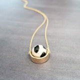 Eclipse Necklace - black white spotted round stone in semicircle pendant, Tibetan Dzi agate bead ball, giraffe print in gold half circle - Constant Baubling