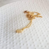Gold Dash Necklace, tiny rectangle necklace, square tube bead, slider pendant, delicate chain, simple gold necklace, small gold bar necklace - Constant Baubling