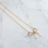 Gold Bow Necklace - 14K gold filled necklace, small bow necklace, bow pendant, wire bow necklace, little bow necklace, bow charm, simple bow - Constant Baubling