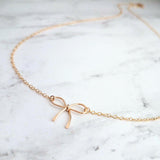 Gold Bow Necklace - 14K gold filled necklace, small bow necklace, bow pendant, wire bow necklace, little bow necklace, bow charm, simple bow - Constant Baubling