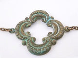 Clover Necklace - green blue verdigris patina on medium antique bronze/brass chain - large lucky 4 leaf lobe pendant w/ ornate detail - Constant Baubling