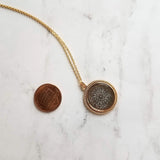 Gold Black Medallion Necklace, gold medallion pendant, cut out pendant, filigree necklace, round medallion necklace lacy black gold necklace - Constant Baubling
