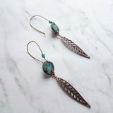 Long Copper Feather Earrings, verdigris patina earring, long rustic earring, long narrow earring, rust brown blue earring, blue patina disk - Constant Baubling
