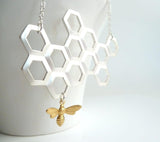 Honeycomb Necklace - gold brass bumblebee dangles from large bee hive pendant in matte silver on simple silver plated chain - Constant Baubling