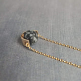 Matte Black Stone Necklace, eclipse necklace, snowflake obsidian necklace, spotted obsidian pendant, gold semicircle, modern half circle orb - Constant Baubling