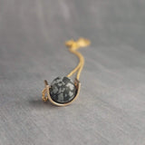 Matte Black Stone Necklace, eclipse necklace, snowflake obsidian necklace, spotted obsidian pendant, gold semicircle, modern half circle orb - Constant Baubling