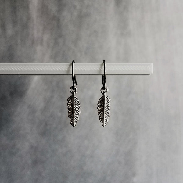 Gunmetal Feather Earrings, blackened silver feather, tiny feather earring, small gun metal feather, little feather dangle, simple feather, silvery black feather earring