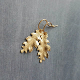 Little Gold Oak Leaf Earrings - raw brass leaves dangle on gold plated simple hooks or upgraded 14K SOLID GOLD hooks, tiny brass detailed leaf charm, autumn dangle, minimalist fall jewelry gift for her, acorn oak tree jewelry