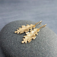 Little Gold Oak Leaf Earrings - raw brass leaves dangle on gold plated simple hooks or upgraded 14K SOLID GOLD hooks, tiny brass detailed leaf charm, autumn dangle, minimalist fall jewelry gift for her, acorn oak tree jewelry