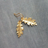 Little Gold Oak Leaf Earrings - raw brass leaves dangle on gold plated simple hooks or upgraded 14K SOLID GOLD hooks, tiny brass detailed leaf charm, autumn dangle, minimalist fall jewelry gift for her, acorn oak tree jewelry