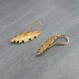 Little Gold Oak Leaf Earrings - raw brass leaves dangle on gold plated simple hooks or upgraded 14K SOLID GOLD hooks, tiny brass detailed leaf charm, autumn dangle, minimalist fall jewelry gift for her, acorn oak tree jewelry
