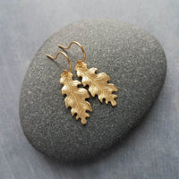 Little Gold Oak Leaf Earrings - raw brass leaves dangle on gold plated simple hooks or upgraded 14K SOLID GOLD hooks, tiny brass detailed leaf charm, autumn dangle, minimalist fall jewelry gift for her, acorn oak tree jewelry