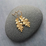 Little Gold Oak Leaf Earrings - raw brass leaves dangle on gold plated simple hooks or upgraded 14K SOLID GOLD hooks, tiny brass detailed leaf charm, autumn dangle, minimalist fall jewelry gift for her, acorn oak tree jewelry