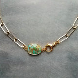 Copper Turquoise Necklace on gold paperclip style chain, front horseshoe shackle screw clasp, facet cut stone pendant, gold brown blue green