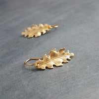 Little Gold Oak Leaf Earrings - raw brass leaves dangle on gold plated simple hooks or upgraded 14K SOLID GOLD hooks, tiny brass detailed leaf charm, autumn dangle, minimalist fall jewelry gift for her, acorn oak tree jewelry