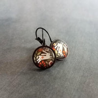 Bunny Earrings, leaping rabbit earring, Easter jewelry, round print under glass on black lever back hooks, snap close leverback, runaway