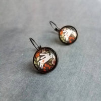 Bunny Earrings, leaping rabbit earring, Easter jewelry, round print under glass on black lever back hooks, snap close leverback, runaway