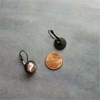 Bunny Earrings, leaping rabbit earring, Easter jewelry, round print under glass on black lever back hooks, snap close leverback, runaway