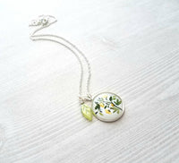 Flower Necklace, yellow flower pendant, floral necklace, plant necklace, light green leaf charm, delicate silver chain, little flowers round - Constant Baubling