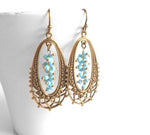 Long Oval Earrings - elongated lacy filigree in antique brass/bronze with tiny blue bead cluster center - fancy decorative boho - Constant Baubling