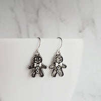 Gingerbread Men Earrings, silver Christmas earring, cookie earring, gingerbread earring, antique silver Xmas earring, bow tie gingerbread - Constant Baubling