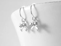 Tiny Silver Bow Earrings, small bow earring, tiny ribbon earring, tied ribbon earring, bow dangle earring, little silver bow earring, mini - Constant Baubling