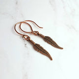 Copper Feather Earrings, long copper earring, narrow feather earring, antique copper feather, oxidized copper dangle, thin tribal boho - Constant Baubling