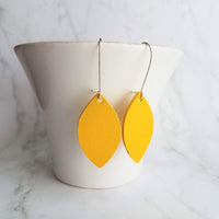 Yellow Earrings - goldenrod/mustard faux vegan leather leaf shape drop on silver kidney wire hooks - plain pointed oval spheroid charm - Constant Baubling