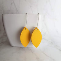 Yellow Earrings - goldenrod/mustard faux vegan leather leaf shape drop on silver kidney wire hooks - plain pointed oval spheroid charm - Constant Baubling