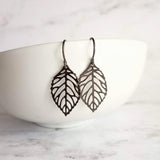 Gunmetal Leaf Earrings, shiny black earring, silver black leaves, small black earring, delicate leaf, black filigree earring little gunmetal - Constant Baubling