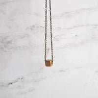 Gold Cube Necklace - solid square brass slider bead on delicate 20 inch silver black chain - minimalist everyday simple plain necklace gift - Constant Baubling
