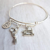 Sewing Charm Bracelet - seamstress hobby/tailor gift - silver adjustable bangle double loop wire w/ tiny sewing machine, scissors, button - Constant Baubling