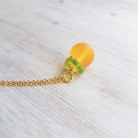 Orange Necklace, small fruit pendant, green leaf charm, orange jewelry, glass orange, translucent orange, Florida fruit, simple gold chain - Constant Baubling