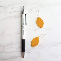 Yellow Earrings - goldenrod/mustard faux vegan leather leaf shape drop on silver kidney wire hooks - plain pointed oval spheroid charm - Constant Baubling