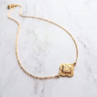 Gold Clover Earring - sweet little stamped 4 leaf/lobe Irish good luck charm on long latching kidney hook - raised design w/ ornate detail - Constant Baubling