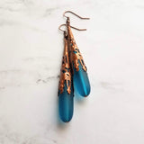 Long Copper Sea Glass Earrings - frosted elongated narrow teal blue teardrop in ornate lacy filigree oxidized antiqued thin cone wrap 3 inch - Constant Baubling
