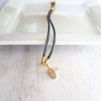 Gold Feather Bracelet, grey cord bracelet, gray gold bracelet, thin bracelet, stacking bracelet, twisted bracelet, minimalist, simple charm - Constant Baubling
