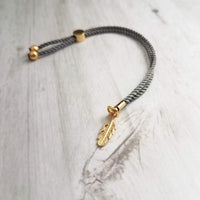 Gold Feather Bracelet, grey cord bracelet, gray gold bracelet, thin bracelet, stacking bracelet, twisted bracelet, minimalist, simple charm - Constant Baubling