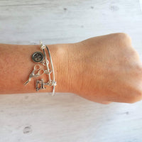 Sewing Charm Bracelet - seamstress hobby/tailor gift - silver adjustable bangle double loop wire w/ tiny sewing machine, scissors, button - Constant Baubling