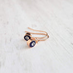 Evil Eye Earrings - small rose gold/navy blue dangle - protect from negative energy harm - good fortune luck symbol - health & happiness - Constant Baubling