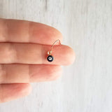 Evil Eye Earrings - small rose gold/navy blue dangle - protect from negative energy harm - good fortune luck symbol - health & happiness - Constant Baubling
