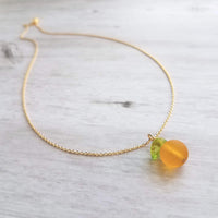 Orange Necklace, small fruit pendant, green leaf charm, orange jewelry, glass orange, translucent orange, Florida fruit, simple gold chain - Constant Baubling