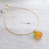 Orange Necklace, small fruit pendant, green leaf charm, orange jewelry, glass orange, translucent orange, Florida fruit, simple gold chain - Constant Baubling