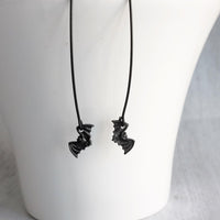 Black Bat Earrings, tiny bat earring, bat dangle, little flying bats, long matte black hook, 2 inch earring, Halloween jewelry, trick treat - Constant Baubling