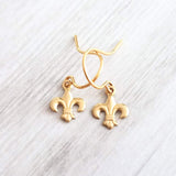 Fleur De Lis Earrings - little tiny gold lily flower charm dangles - small simple ear hooks - French emblem - New Orleans gift for her - Constant Baubling
